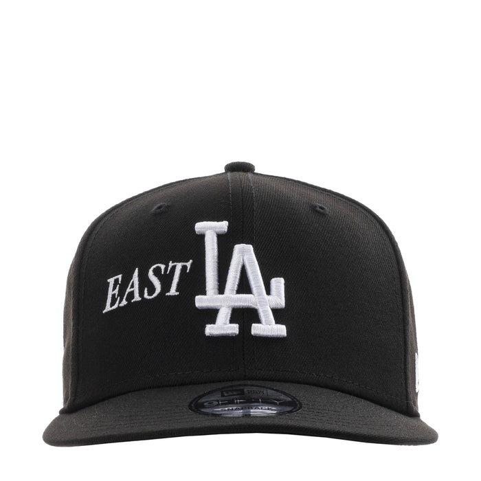 Black baseball cap with East LA logo and white LA monogram on front
