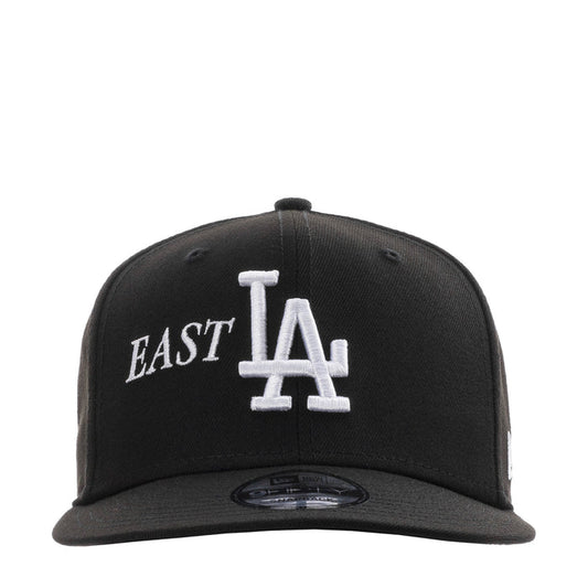 Black baseball cap with East LA logo and white LA monogram on front