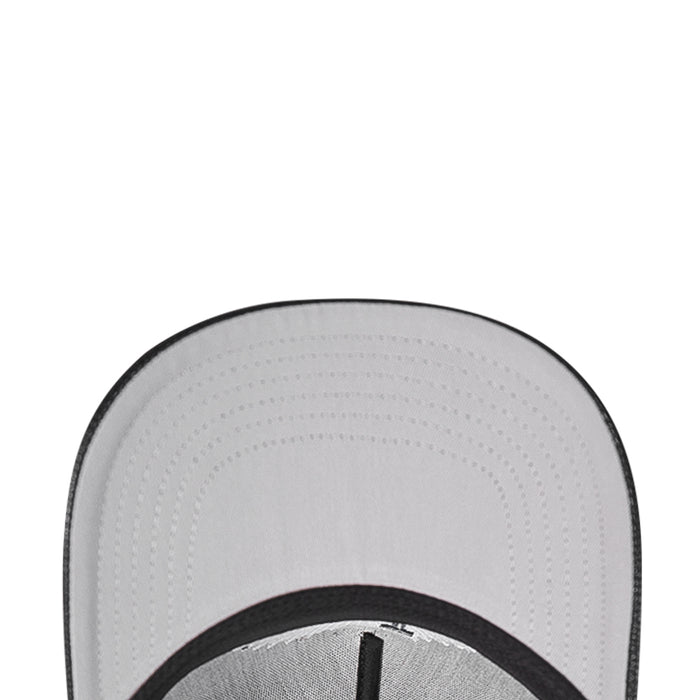 Gray inner panel of a strapback baseball cap with perforated ventilation