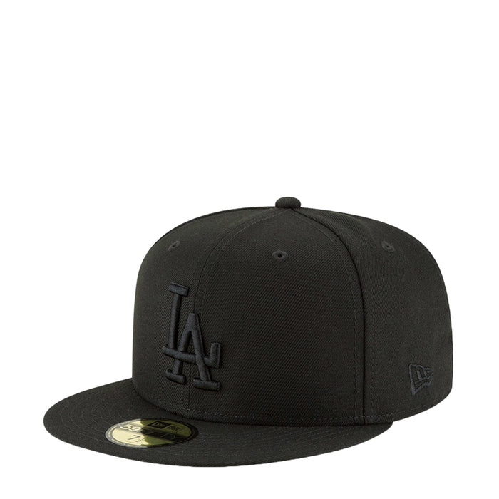 Black baseball cap with embroidered LA logo and small side badge