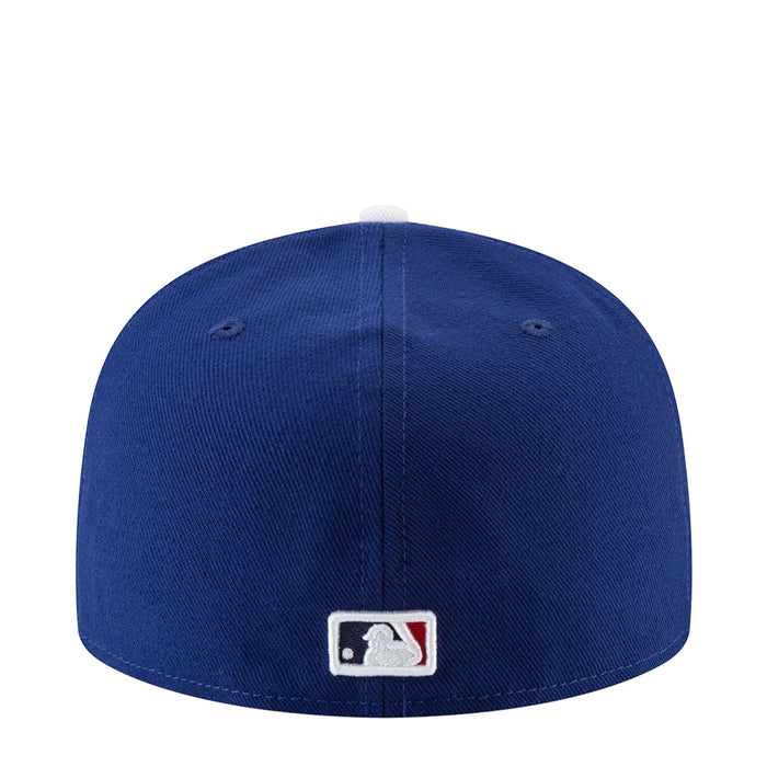 Royal blue baseball cap with MLB logo patch on back
