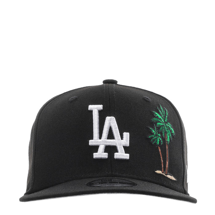Black baseball cap with white LA logo and colorful palm tree embroidery on front