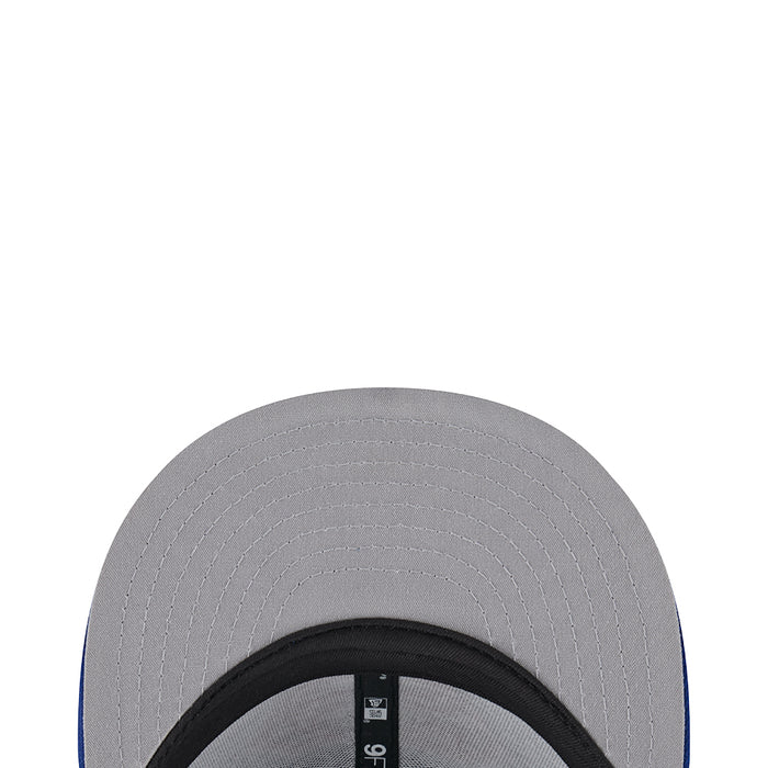 Baseball cap interior view with gray mesh lining and stitched rim