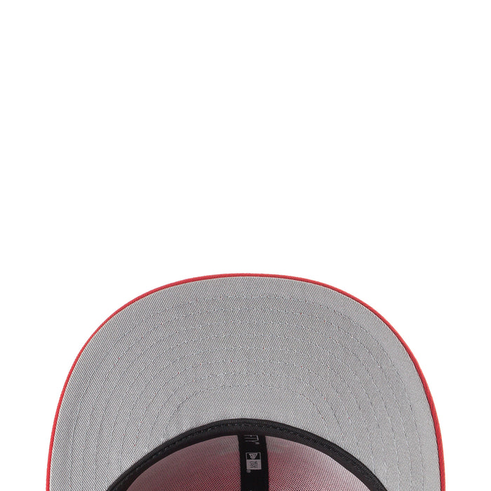 Baseball cap interior with gray lining and red brim edge