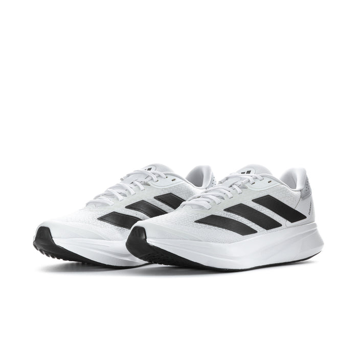Men's white running shoes, side view with black stripes and cushioned midsole