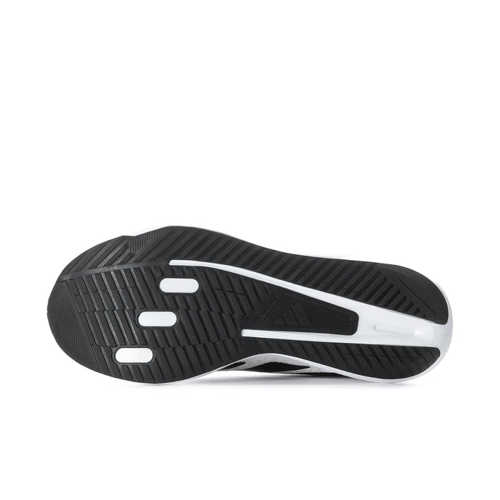 Men's running shoe outsole, black traction tread with white sidewall