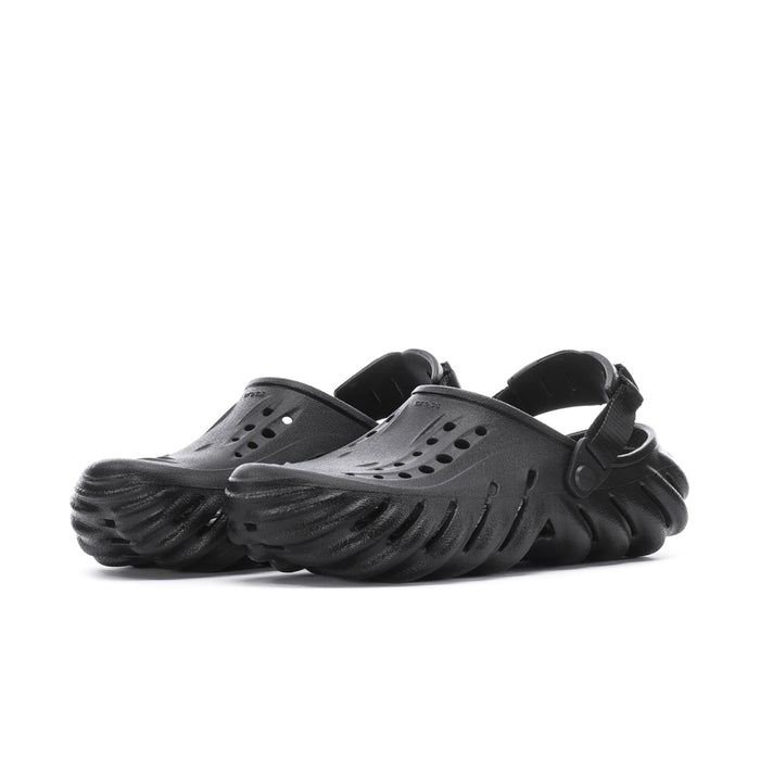 Men's black clog sandal, side view with textured ridged sole