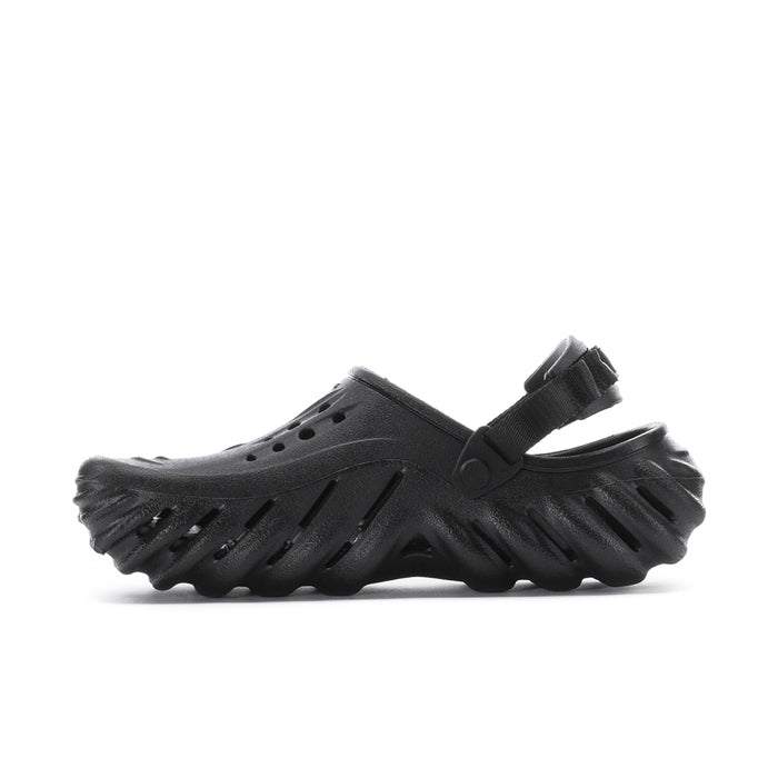 Men's black clog with perforations, ridged sidewall, and strap detail