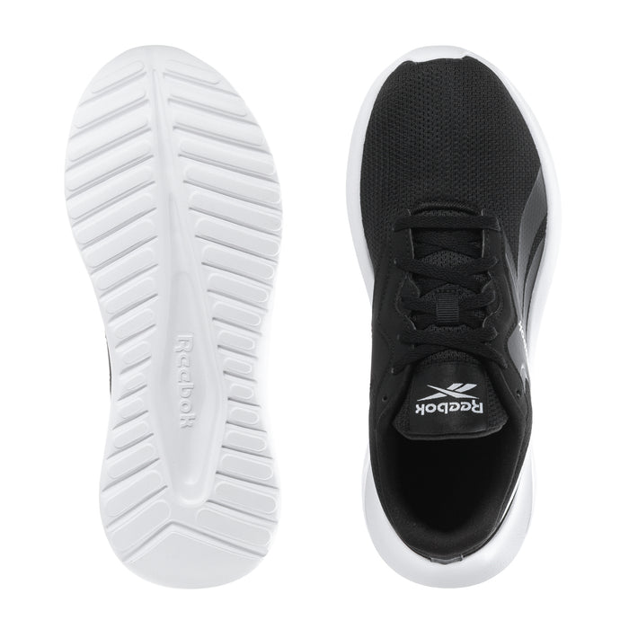 Youth black sneakers showing outsole tread and inner side, white grip sole