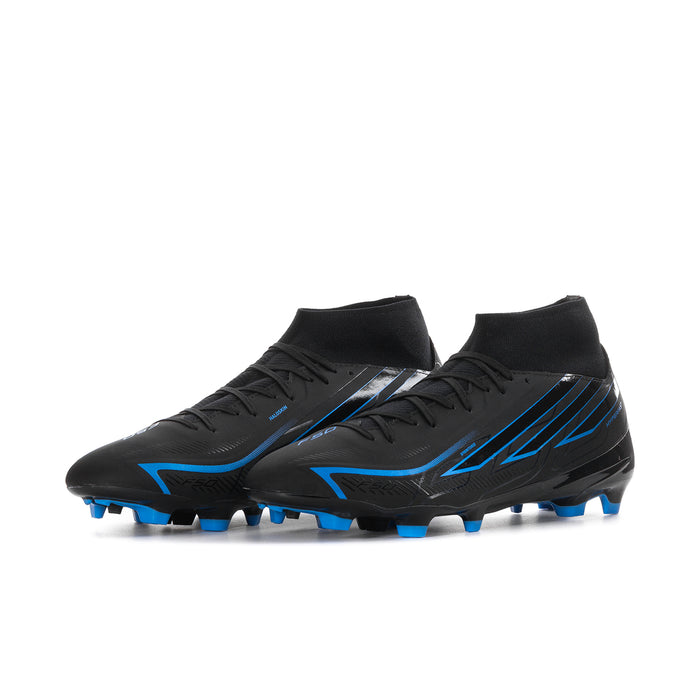 Pair of men's mid-cut black soccer cleats with blue accents and firm-ground studs
