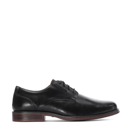 Men's black leather lace-up oxford shoe with brown sole and low heel
