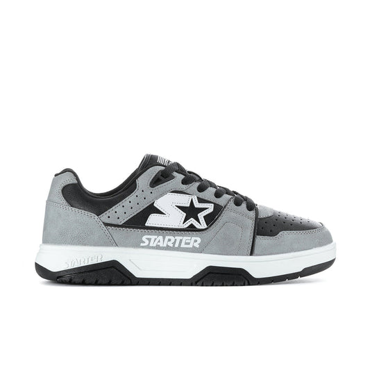 Men's grey and black low-top lace-up sneakers with star logo and white midsole