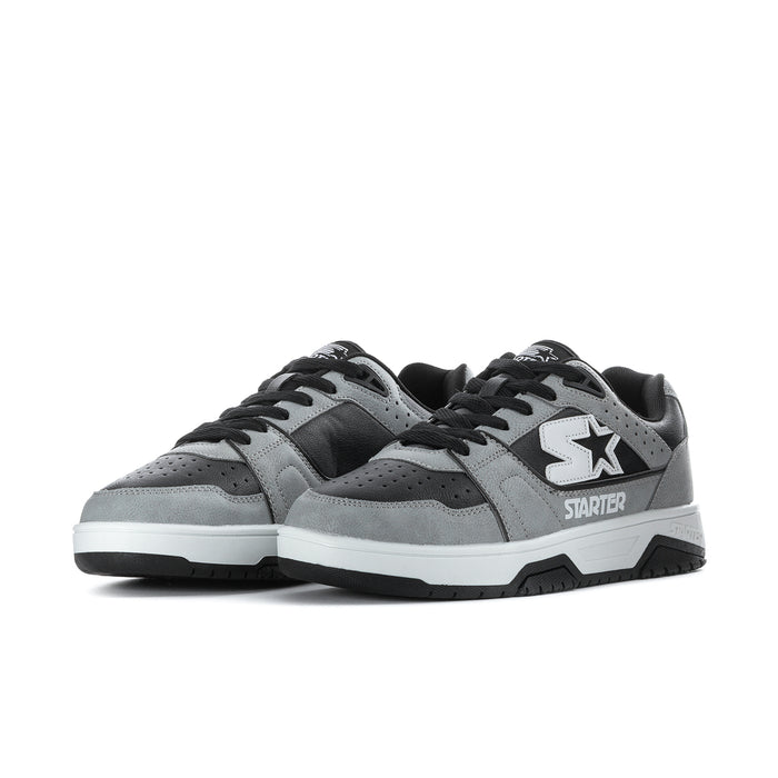 Men's grey and black low-top sneakers, side-by-side view, lace-up with star emblem