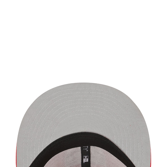 Youth gray trucker cap with black inner brim and stitched paneling