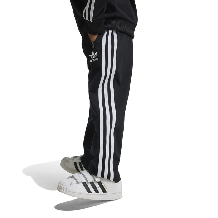 Kids black track pants with white vertical stripes and ribbed cuffs