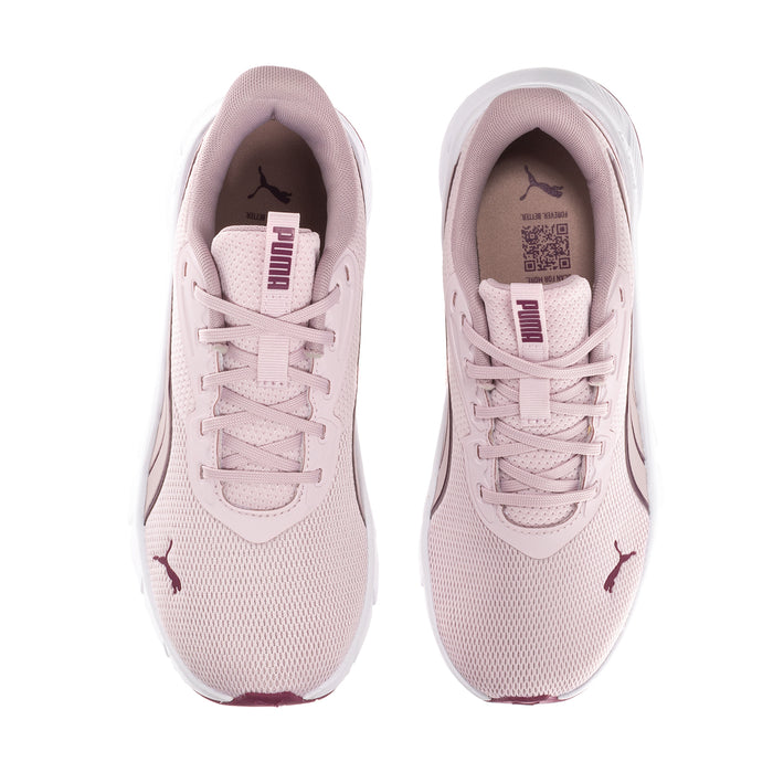 Light pink women's lace-up sneakers with padded tongue, visible PUMA logo on toe sides