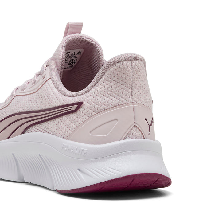 Light pink women's sneakers heel and side panel with cushioned midsole and maroon trim