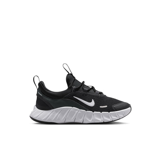Kids' black and white sneakers with cushioned sole and Nike Swoosh