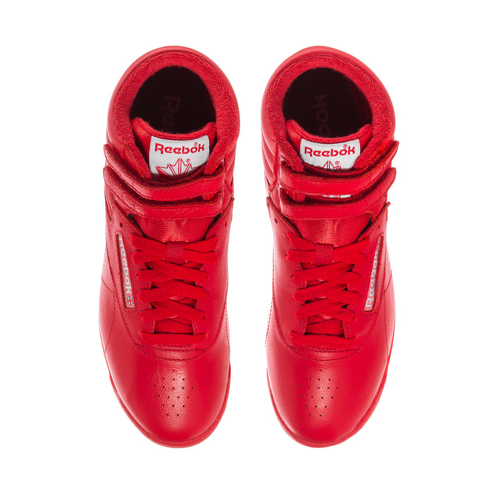 Pair of red high-top sneakers, top openings and lace-up uppers visible
