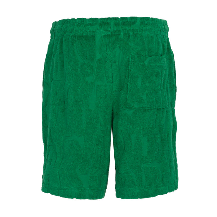 Youth pine green fleece shorts with elastic waistband and relaxed straight legs