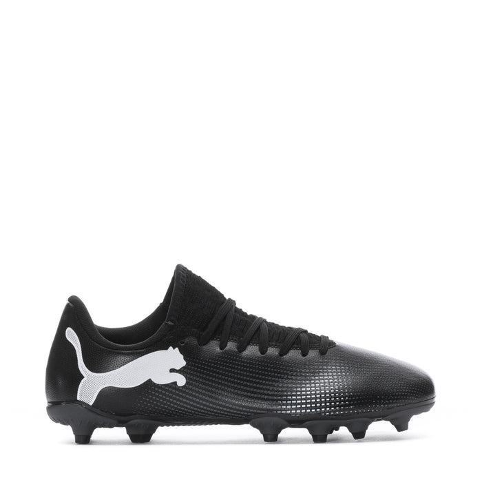 Youth black soccer cleat with white Puma logo and molded studs