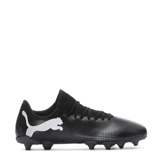 Youth black soccer cleat with white Puma logo and molded studs