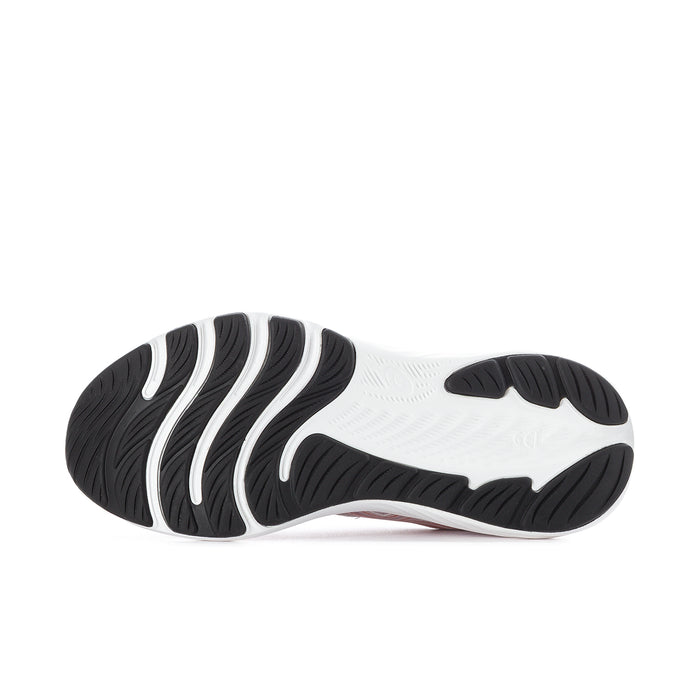 Women's running shoe outsole view with textured black rubber and white forefoot