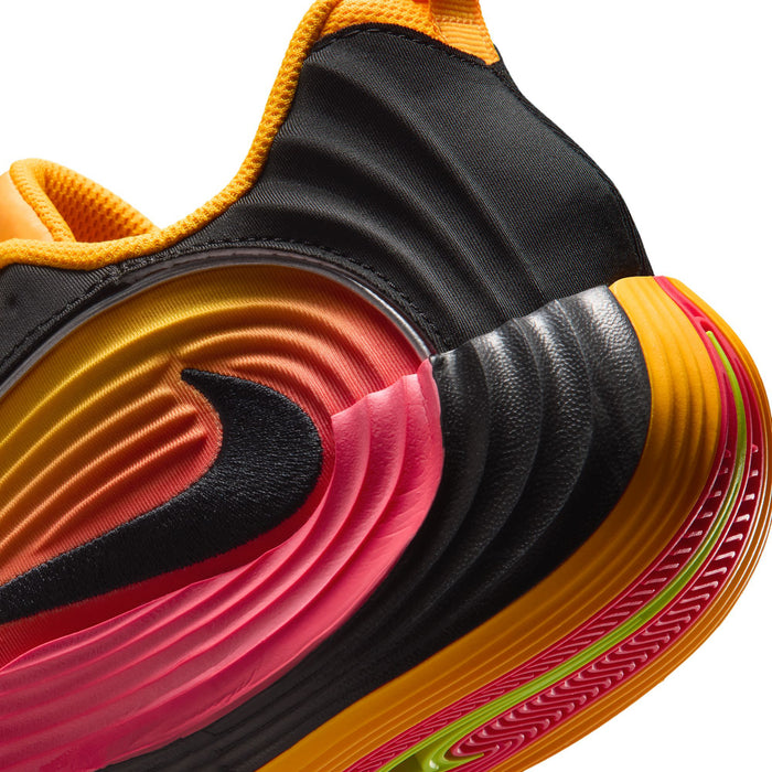 Men's basketball shoe side detail, black and gold panel with pink-red swoosh