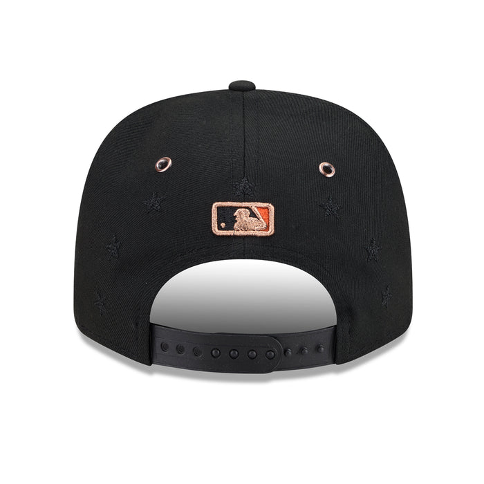 Black baseball cap with orange rectangular logo patch on back panel.