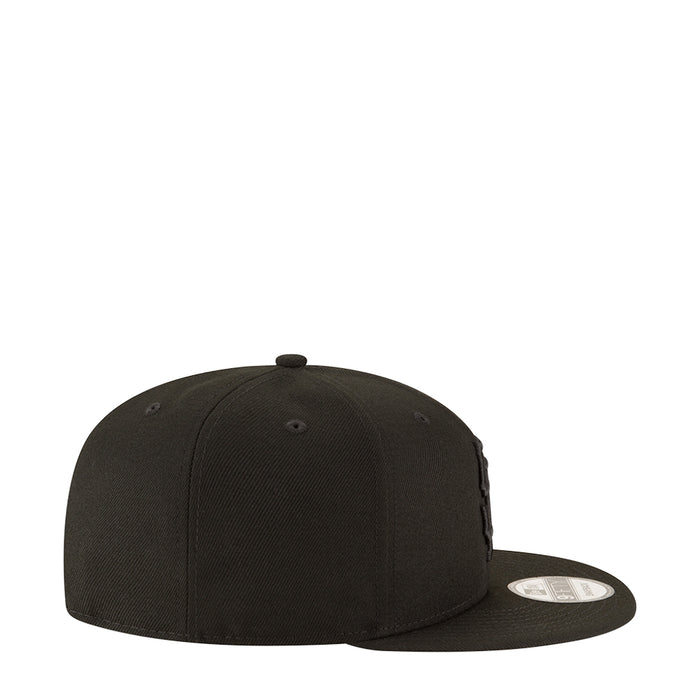 Black baseball cap side profile with small side logo and snapback strap