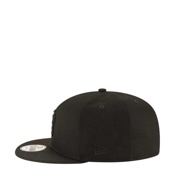 Black baseball cap angled view with front logo and curved brim