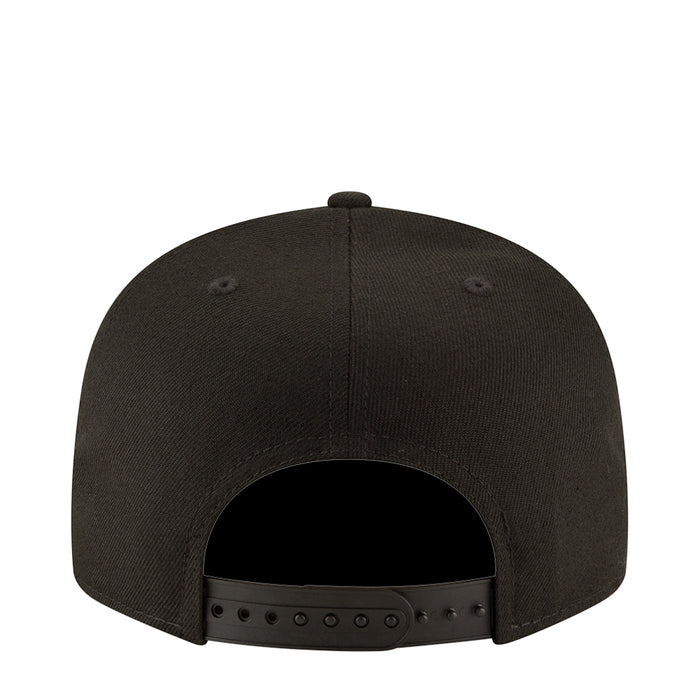 Black baseball cap back view with ventilation eyelets and adjustable strap