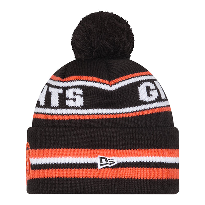 Black knit beanie with pom-pom, orange and white striped band, side Giants letters