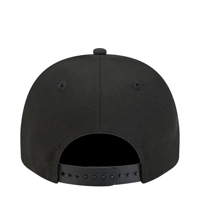 Youth black baseball cap showing open back snapback strap and ventilation holes.