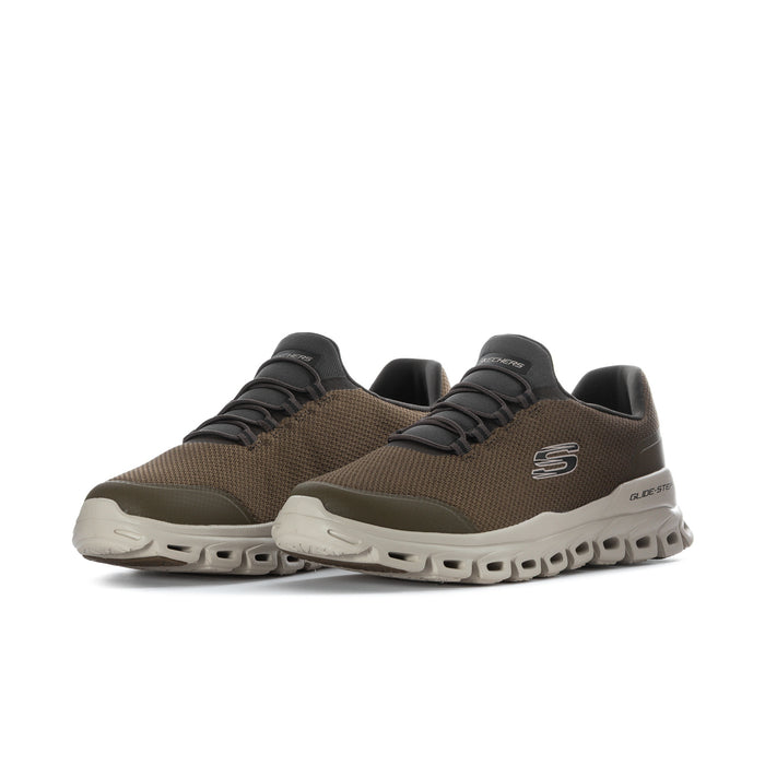 Men's wide olive-brown sneakers, side view with black laces and white rocker outsole