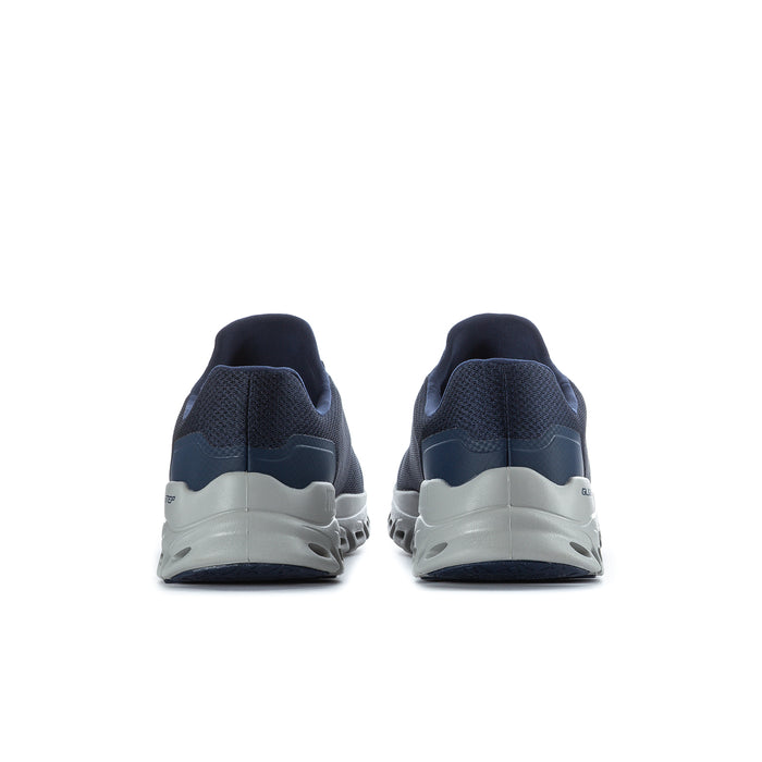 Men's navy sneakers with heel view and white/gray cushioning pods