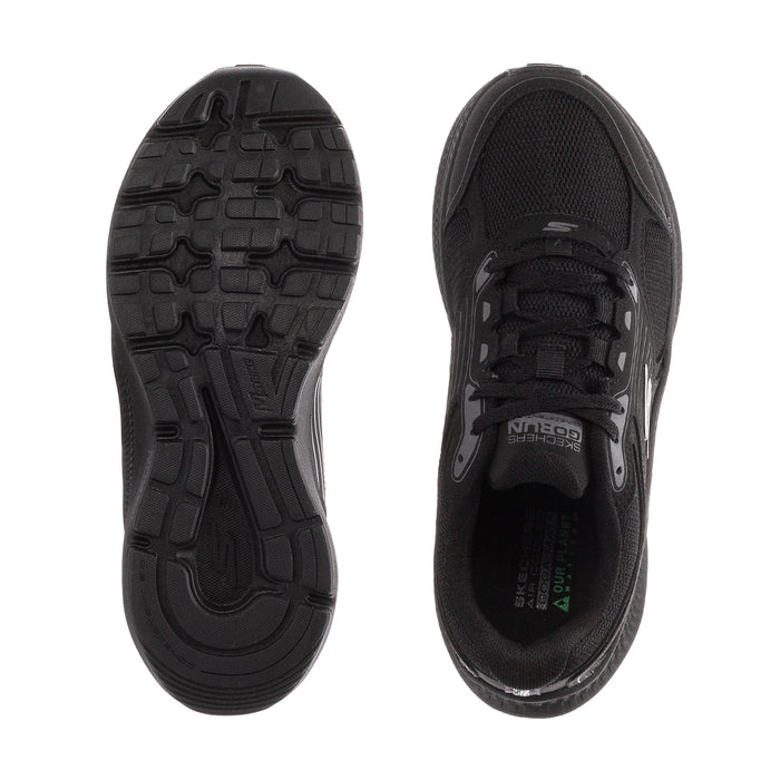 Black women's running shoe outsole and insole view, treaded rubber sole