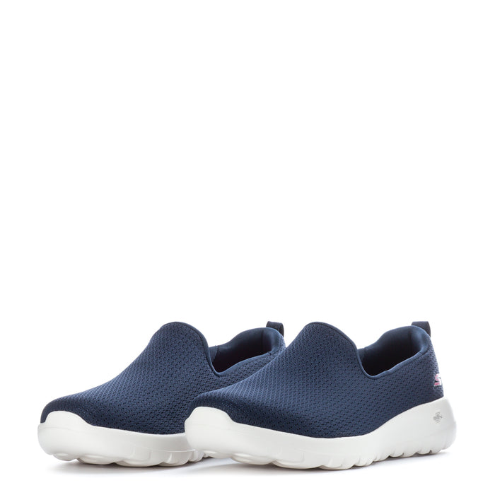 Women's navy slip-on sneakers shown as a pair with white soles