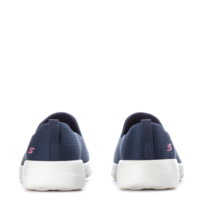 Women's navy slip-on sneakers with white midsoles, rear view