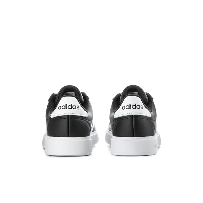 Men's adidas sneakers heel view in black with white sole and logo