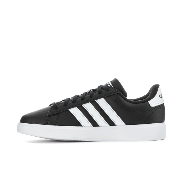 Men's black adidas low-top sneaker with three white stripes and lace-up