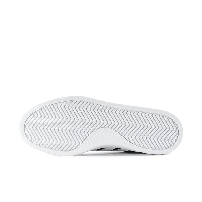 White rubber outsole with zigzag traction pattern for adidas sneakers