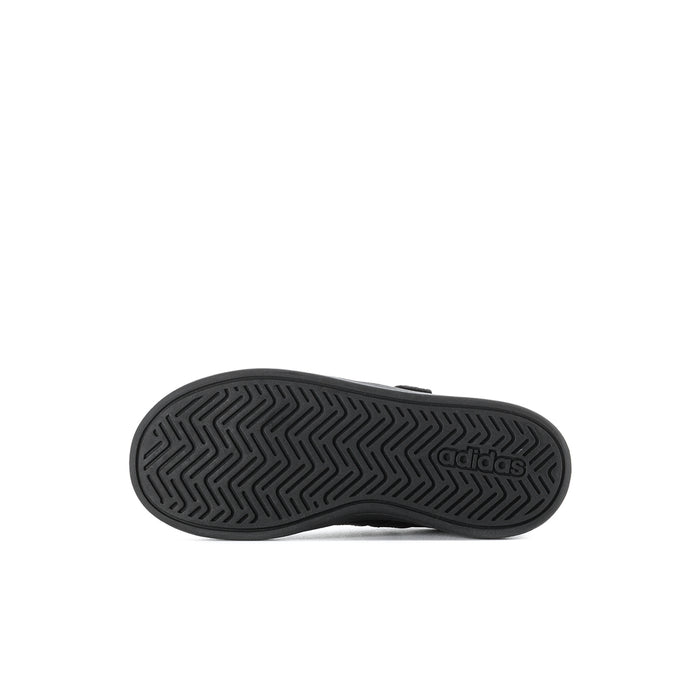 Kids black rubber outsole with herringbone tread and adidas logo.