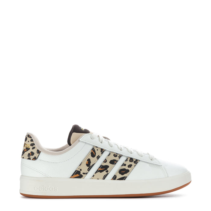 Women's adidas leather sneaker with white laces and leopard stripe panels, gum sole