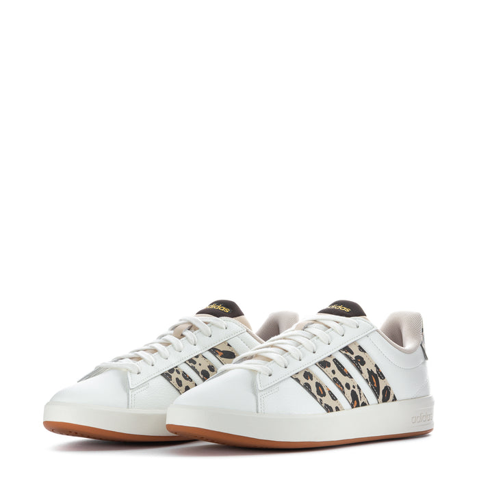 Pair of women's adidas sneakers, white uppers with leopard stripe detailing