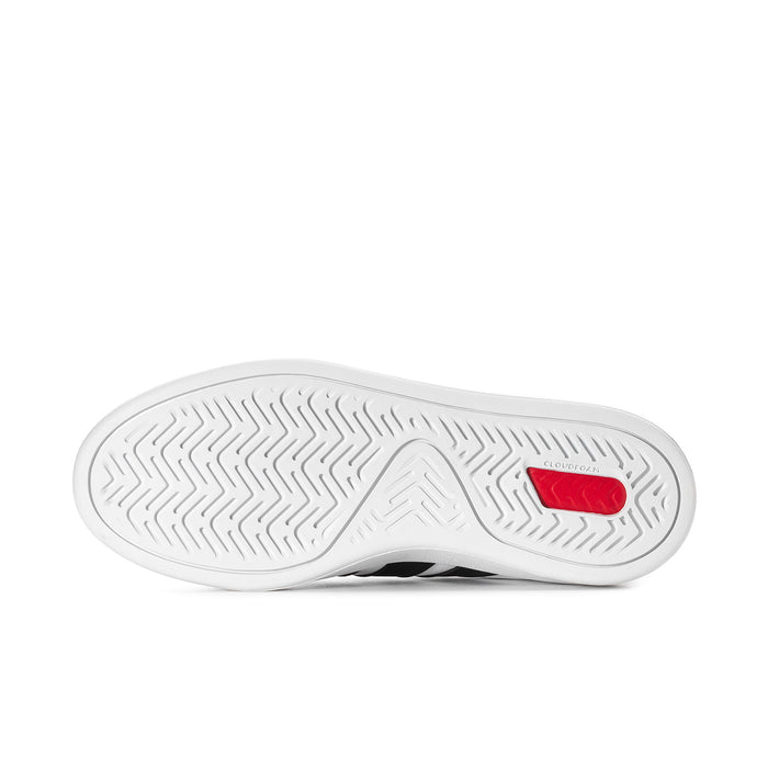Women's adidas Grand Court 3.0 outsole, white rubber tread with red accent insert.