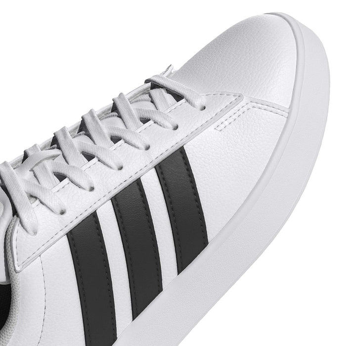 Women's adidas Grand Court 3.0 upper close-up, white leather with black 3-Stripes and laces.