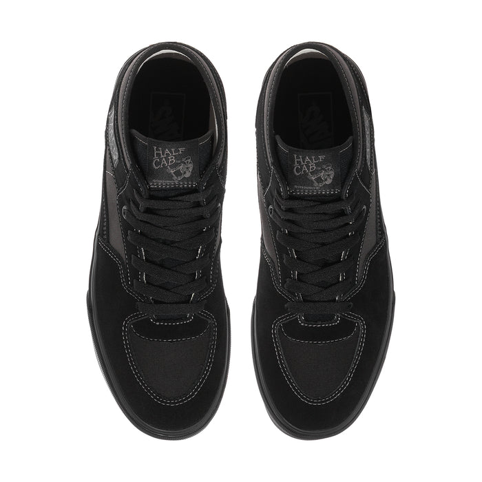 Men's black high-top sneakers, top view showing lace panel and logo on tongue