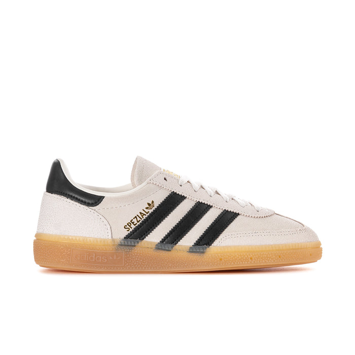 Women's white and black adidas Spezial low-top sneakers with gold gum sole