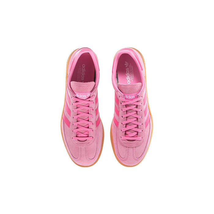 Youth pink adidas sneakers shown from inside with laces and cushioned lining
